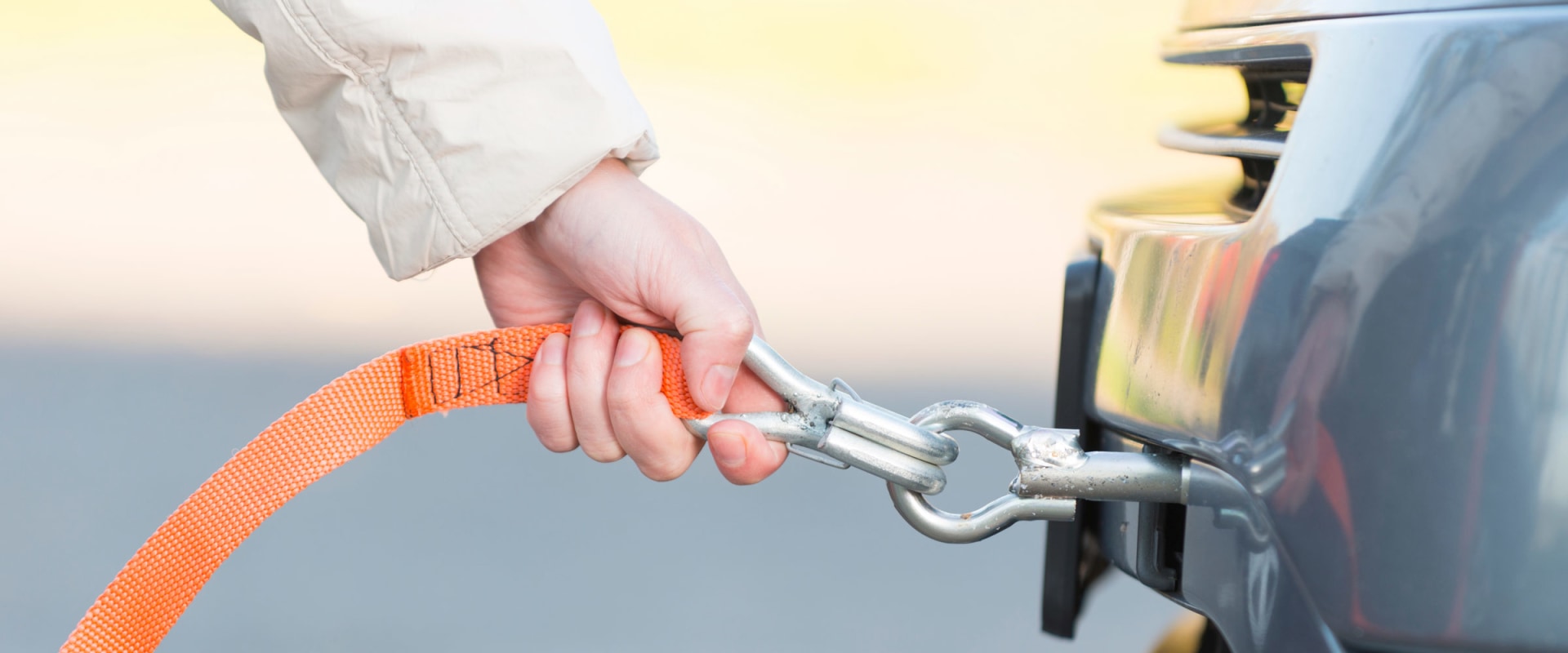 Is it illegal to tow a car uk?