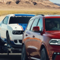 How do you tow a car with another car?